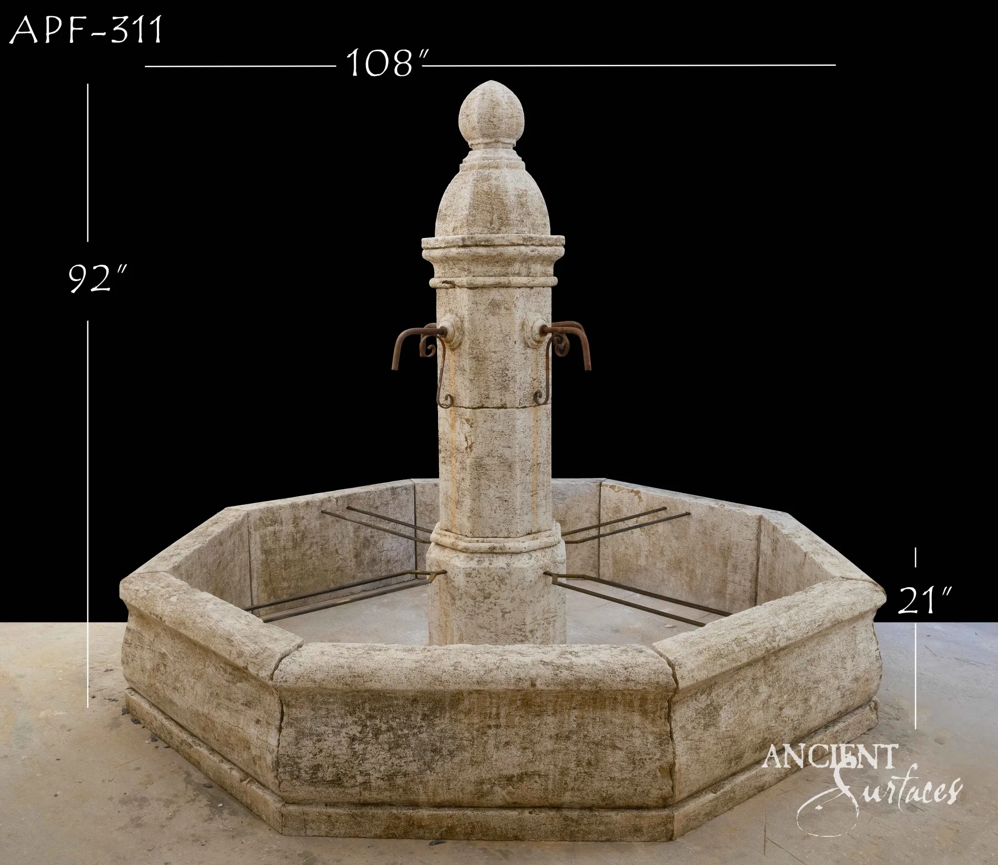 Tall octagonal limestone pool fountain with a carved acorn finial on a columned center
